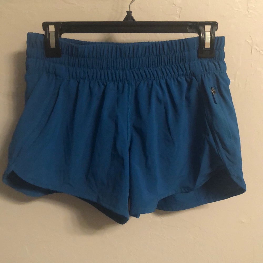 Tracker shorts 4 in. Size 8.